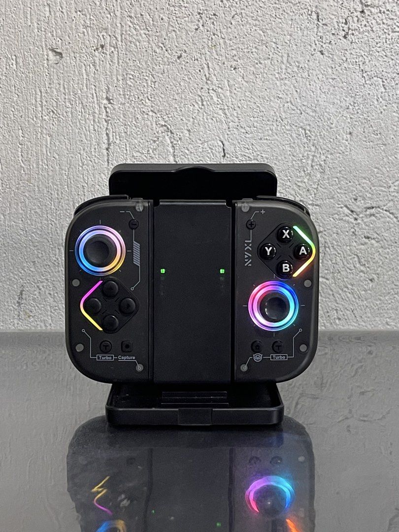 NYXI RGB Wireless Joy-Pad Controller for Nintendo Switch (Category: Controllers) located in Bacoor. Submitted by icarusjinzakk (Listing ID 1469197861, Image 1). Description: Nyxi Hyperion 2 Wireless Controller For switch Compatible to v1, v2 and oled for attachment (please check photos for sample on switch oled) Lite and switch 2 (wireless) RGB Lights (steady,breathing mode) Off mode Hall effect jostick Mechanical keys Controller and holder only 