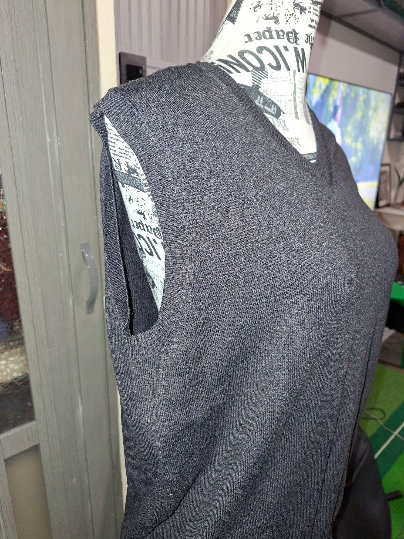 Odee Black V-Neck Knit Sweater Vest Size M (Category: Sleeveless) located in Manila. Submitted by mialiurshop (Listing ID 1469225453, Image 2). Description: - Brand: Odee - Color: Black - Size: Medium - Material: Soft acrylic and nylon blend - Design: V-neck with ribbed armholes and hem - Origin: Made in China - Condition: Great layering piece for cooler weather - More on like large - unisex perfect for white long sleeves combined .