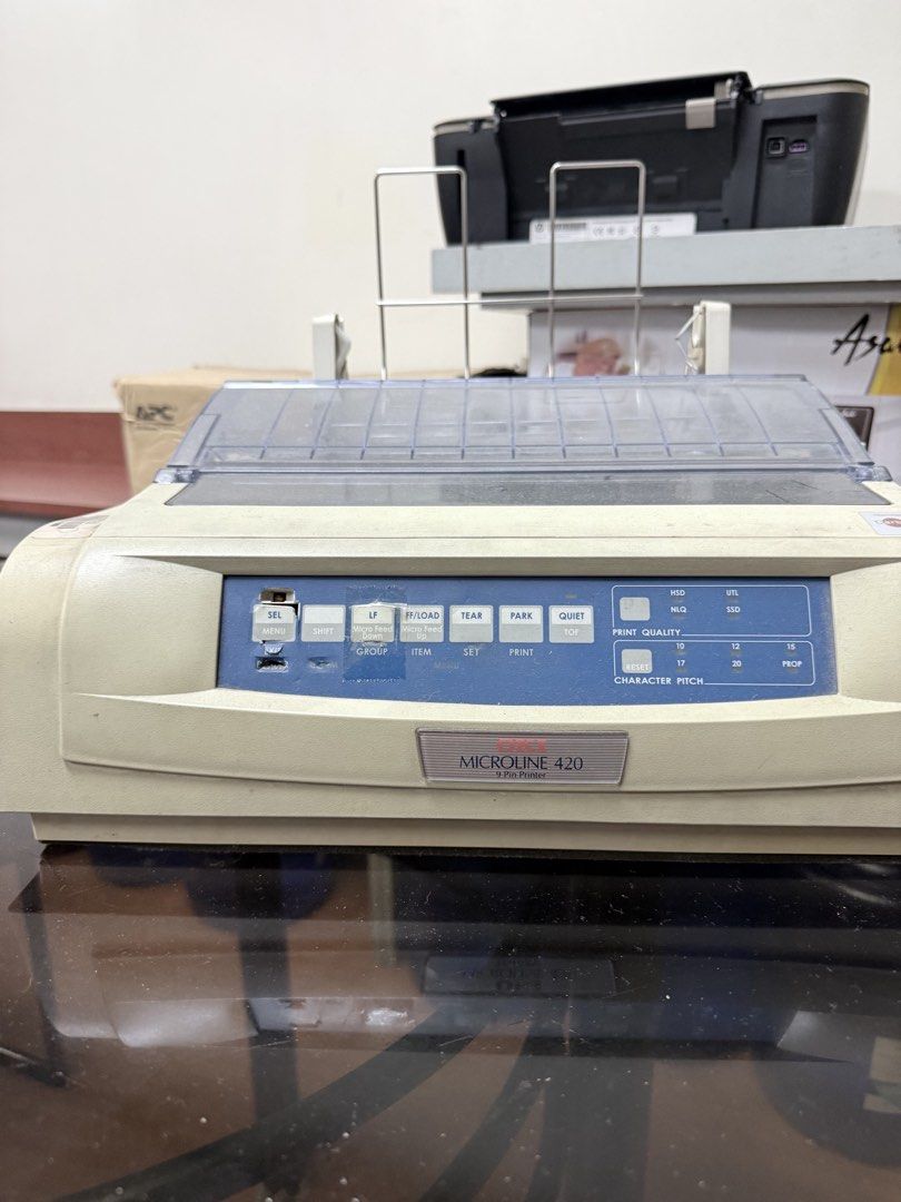 OKI Microline 320 Turbo 9 Pin Printer (Category: Printers, Scanners & Copiers) located in Antipolo. Submitted by nil.nil1 (Listing ID 1469386429, Image 3). Description: - Model: OKI Microline 320 Turbo 9-pin dot matrix printer - Condition: Dusty from storage, powers on and works great - Features: Heavy-duty build with top tractor feed rack and standard push-button control panel - Ideal Use: Perfect for continuous form printing, invoices, and mult