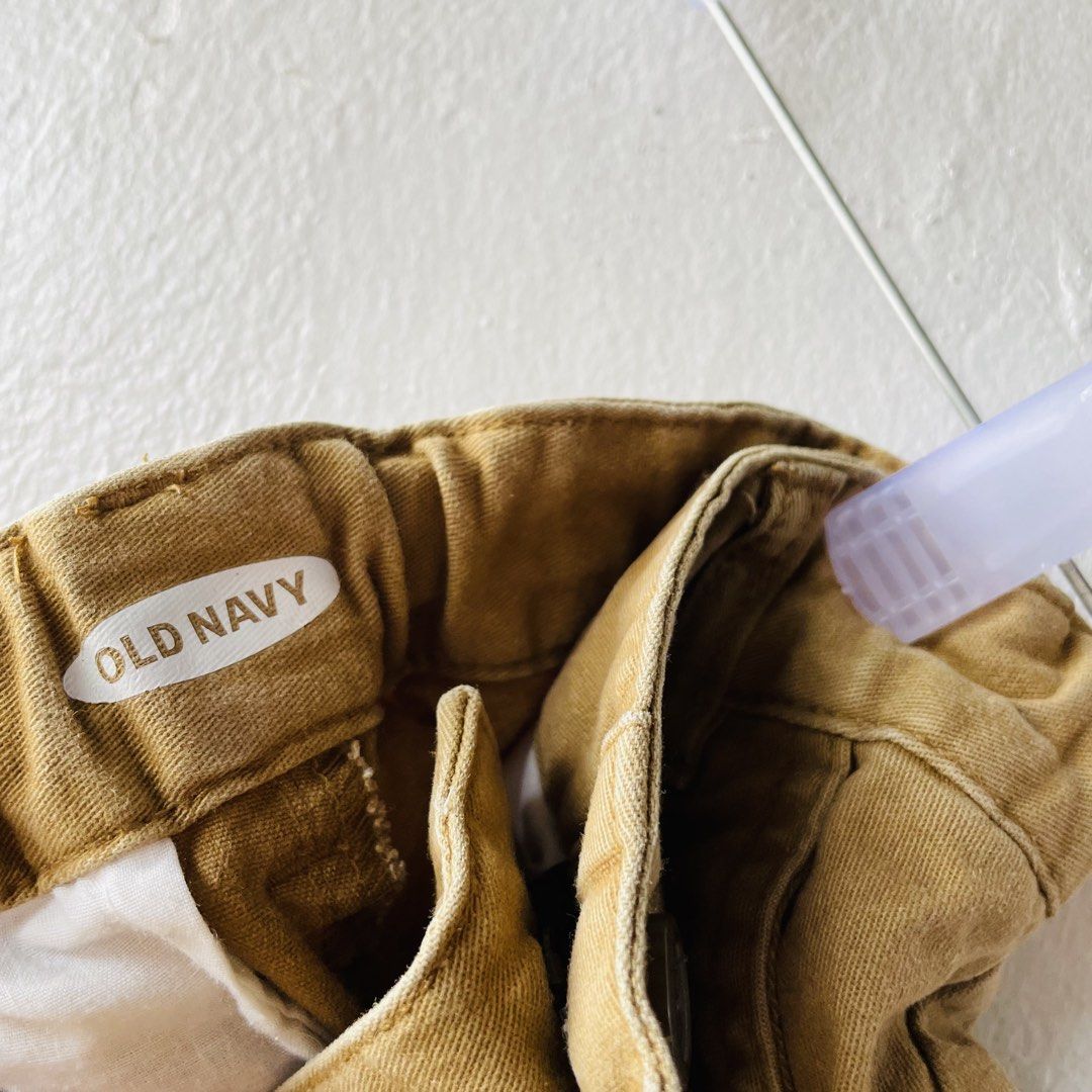 Old Navy Mustard Yellow Shorts (Category: Shorts) located in Caloocan City. Submitted by lovemyclothes21 (Listing ID 1469270841, Image 3). Description: - Brand/Style: Old Navy Kids Classic Chino Shorts - Color: Mustard Yellow - Size: 5-6 years old - Features: Front pockets, belt loops, button closure - Condition: Washed, clean, and ready for a new owner - Perfect for: Everyday casual wear in warm weather.