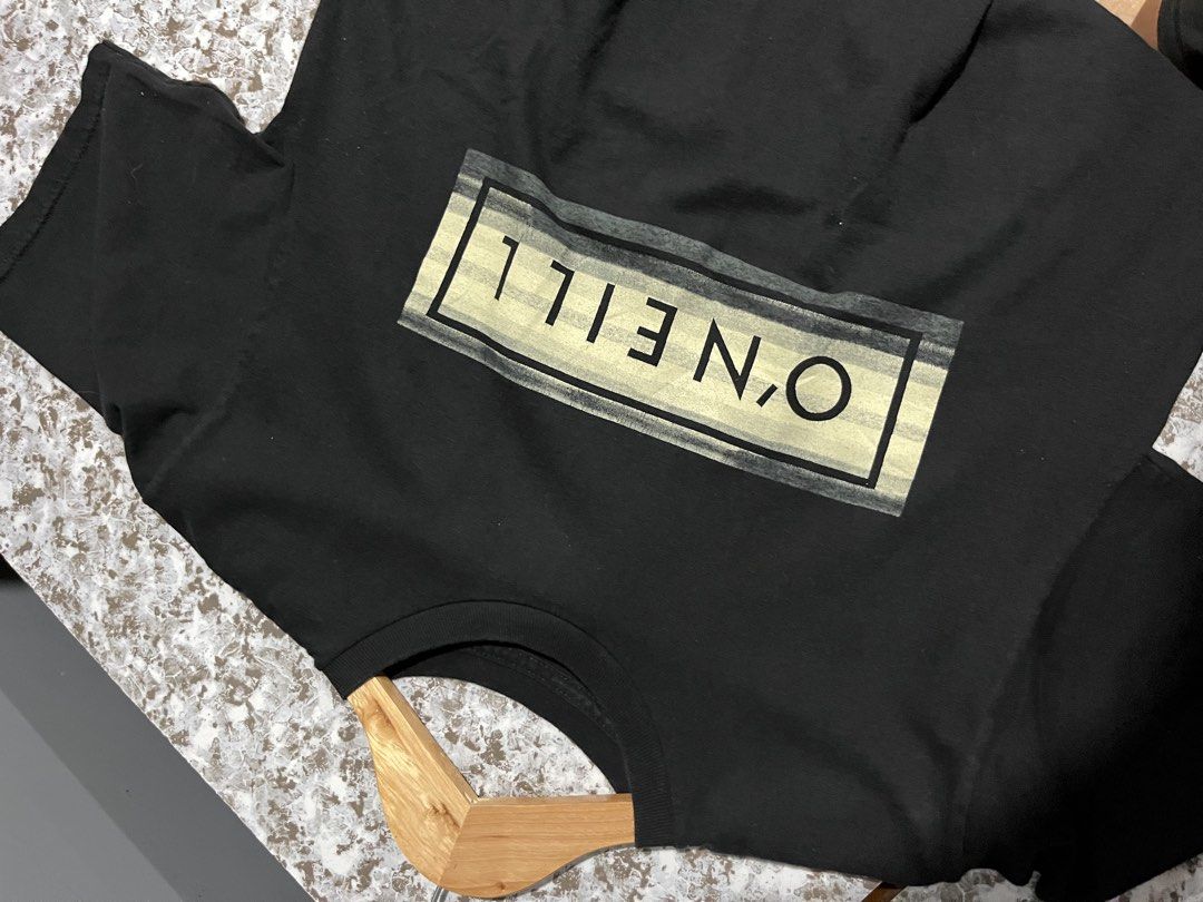 O'Neill Black Classic Tee Size S (Category: Tshirts & Polo Shirts ) located in Maasin. Submitted by niconii090 (Listing ID 1469170841, Image 2). Description: - Brand: O'Neill - Color: Classic Black - Material: 100% Cotton - Design: Rectangular box logo print in muted neutral tones - Details: Crew neck, short sleeves - Condition: Clean, no stains, no holes 📏 17 x 25 (inches).