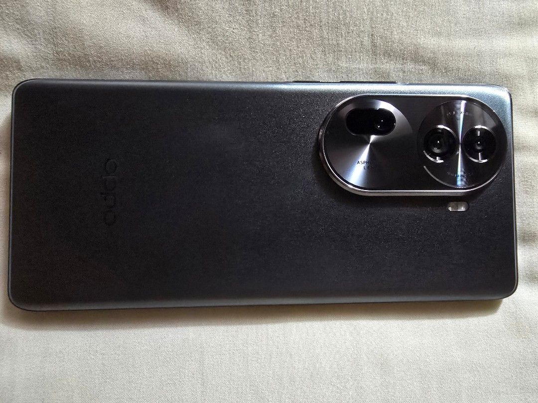 Oppo Reno 11 pro 5g (Category: OPPO) located in Manila. Submitted by fastwolf_777 (Listing ID 1469224921, Image 3). Description: - Brand/Model: Oppo Reno 11 Pro 5G - Color: Sleek Black - Storage & RAM: 512GB Storage, 12GB RAM (+4GB extension) - Processor: MediaTek Dimensity 8200 - Cameras: 50MP + 32MP + 8MP rear cameras, 32MP front camera - Battery: 4600 mAh - Condition: Excellent, well-kept - Meetup Locations: near at my area only. manila or mak