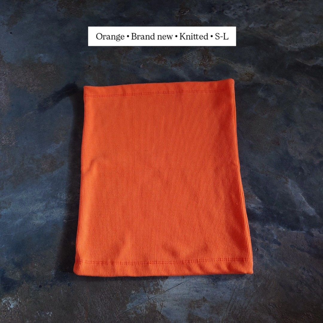 Orange Knitted Tube Top (Category: Sleeveless) located in Diffun. Submitted by declutteredbyJill (Listing ID 1469238674, Image 1). Description: - Color: Bright orange - Material: Stretchy ribbed knit - Size: Fits S to L comfortably - Condition: Brand new / never worn (no tag) - Style: Versatile basic for layering or warm weather.