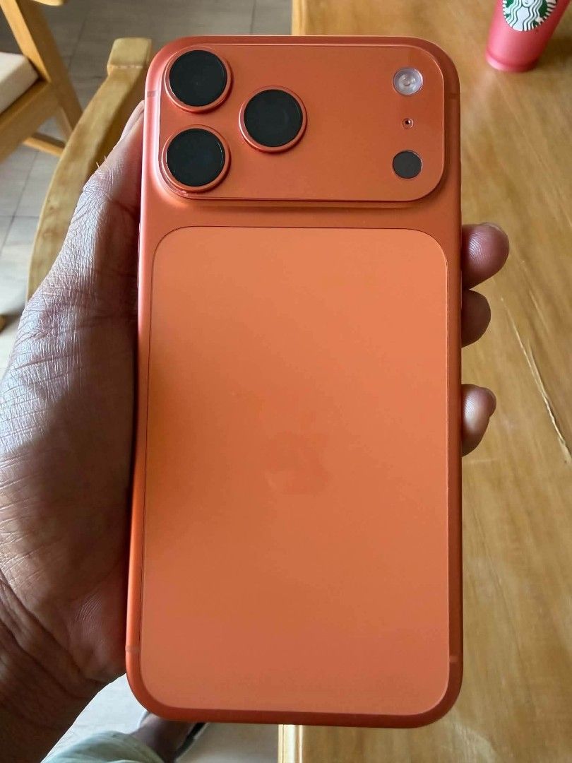 Orange replica dummy smartphone model toy (Category: iPhone 17 Series) located in Valenzuela. Submitted by sweetwearph (Listing ID 1469175292, Image 1). Description: For sale! Iphone 17 promax 512 GB Rarely used 95-98% Battery health (di na check bago ireset 😬) With small scratch on the side Complete with box 72k RFS: Upgrade.