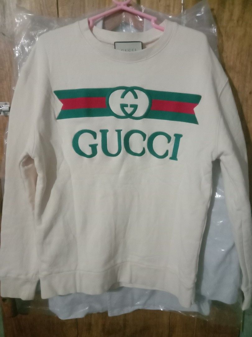 Orig GUCCI embroidered logo sweater (Category: Luxury Apparel) located in Baguio. Submitted by oliviapreloved100620 (Listing ID 1469270664, Image 1). Description: .