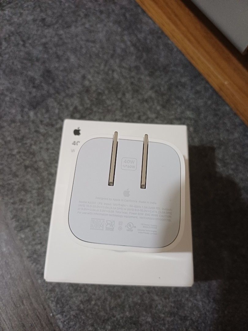 Original Apple 40W Dynamic Adapter (Category: Chargers & Cables) located in Taytay. Submitted by techie01 (Listing ID 1469307390, Image 1). Description: ORIGINAL PO May maliit na scratch but doesnt affect the performance. Bawal sa maselan po Fixed Price Pick up only. Kayo mag pick up or pa lalamove po. Loc: Taytay Rizal.