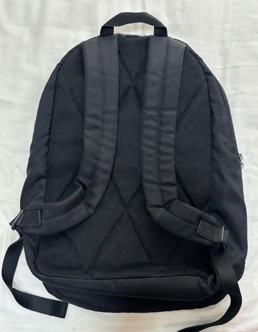 Original Penguin Munsingwear Black Penguin Print Backpack (Category: Backpacks) located in Quezon City. Submitted by aussomefinds (Listing ID 1458769695, Image 2). Description: - Stylish black backpack with a subtle all-over penguin print. - Front zip pocket for easy access to essentials. - Spacious main compartment for all your belongings. - Comfortable padded straps for easy carrying. - Authentic Original Penguin by Munsingwear branding. - Idea