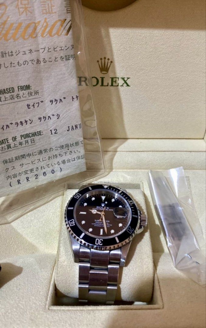 Original ROLEX Sub Date Watch⌚️ (Category: Luxury Watches) located in Cebu City. Submitted by luxurycollectionhouse (Listing ID 1469378386, Image 1). Description: Complete Set. 40MM. Year 2001 But In Prestine Condition. .