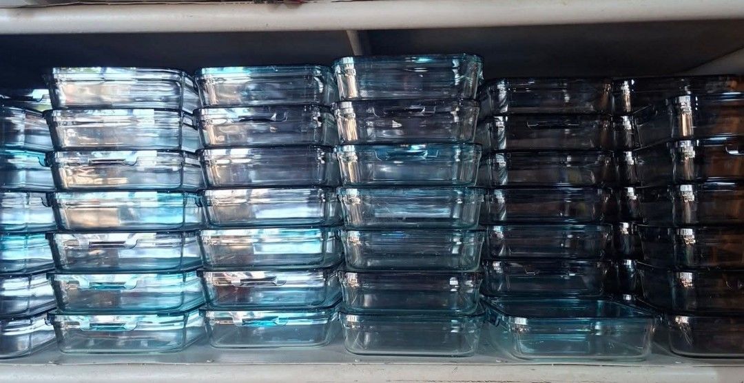 Pack n Range Glass Food Storage Container (Category: Food Organization & Storage) located in Davao. Submitted by lingxu23 (Listing ID 1469227029, Image 3). Description: - Brand: Pack n Range - Color: Teal green tint with clear visibility - Material: Heavy-duty glass with a thick rim - Shape: Square with rounded corners - Design: Stackable for easy pantry organization and storage - Perfect for: Meal prep, food storage, and kitchen organization - A