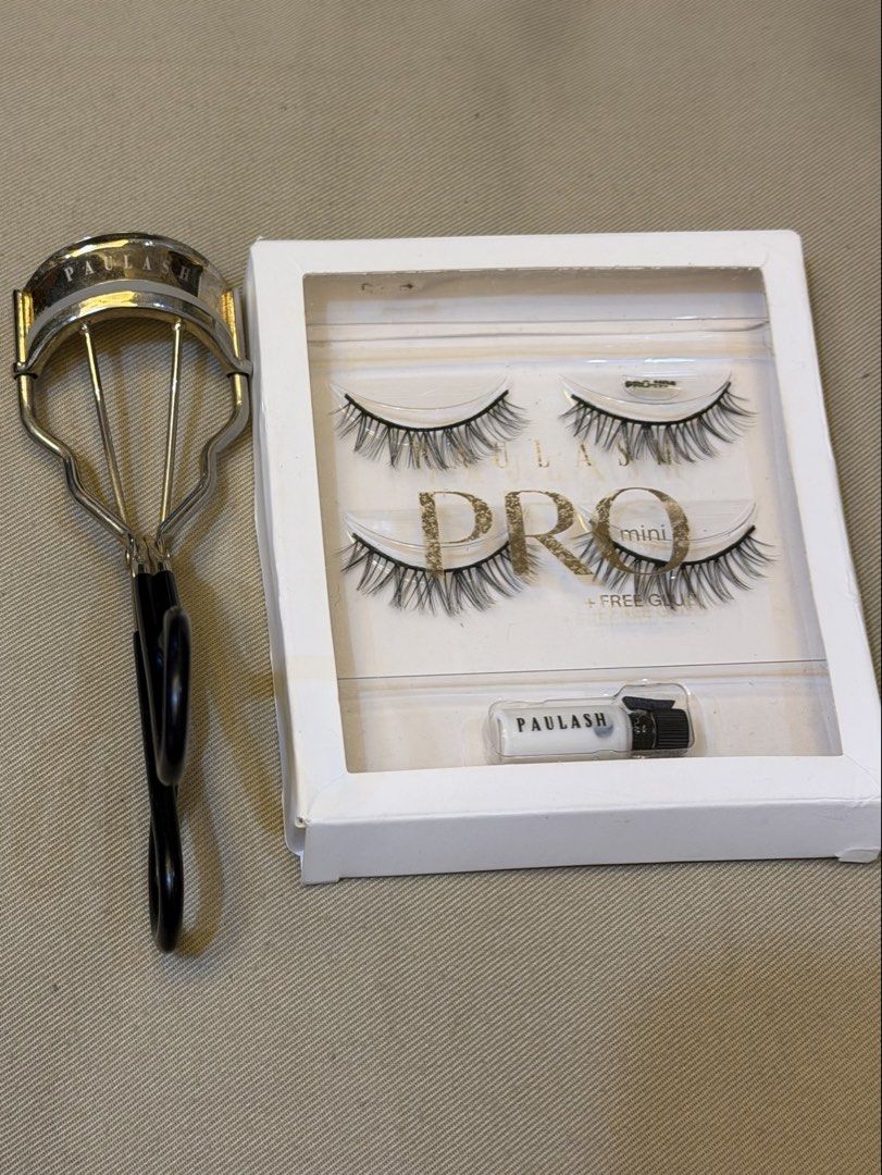 Paulash Eyelash Curler and Pro Mini Lashes Set (Category: Makeup) located in Manila. Submitted by sonnyangie (Listing ID 1469211966, Image 1). Description: 💯 original Loc: Taguig ❌ no to bogus buyer - Brand: Paulash - Condition: Brand new / Unused - Inclusions: Pro mini false eyelashes, lash glue, gold and black branded curler - Packaging: Comes with original white box - Perfect for leveling up your everyday makeup routine.