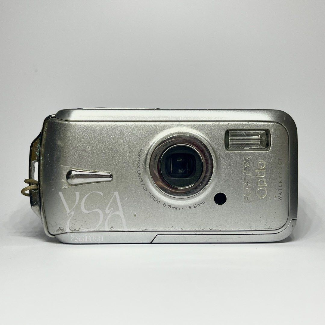 PENTAX OPTIO W10 Digital Camera Digicam (Category: Cameras) located in Manila. Submitted by ysabelaaa__ (Listing ID 1469304283, Image 1). Description: PENTAX OPTIO W10 ⭐️ #preowned ₱2700 FIXED + SF issue: bloated battery (need to manually remove sa batt slot / use tweezers) ✮ all sample shots posted! ✮ 6.0 MP, 3x optical zoom ✮ waterproof and dustproof ✮ 8/10 body cosmetics ✮ fully functional - zoom, flash, and all buttons working inclusions: uni