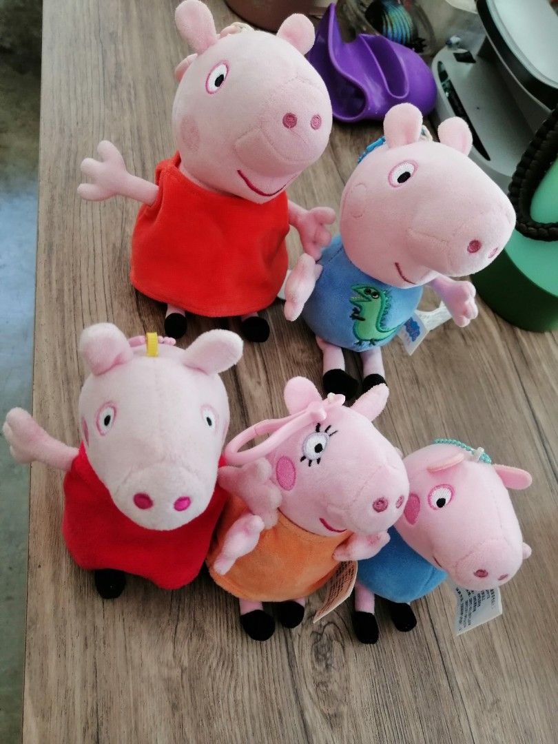 Peppa Pig Plush Toy Keychains Set of Five (Category: Plushies & Soft Toys) located in Angono. Submitted by rlinee_93 (Listing ID 1469274673, Image 2). Description: - Set of 5 adorable Peppa Pig plush keychains and toys - Includes characters in red dress, blue dinosaur shirt, orange dress, and blue dress - Made of soft, clean, and well-kept material.