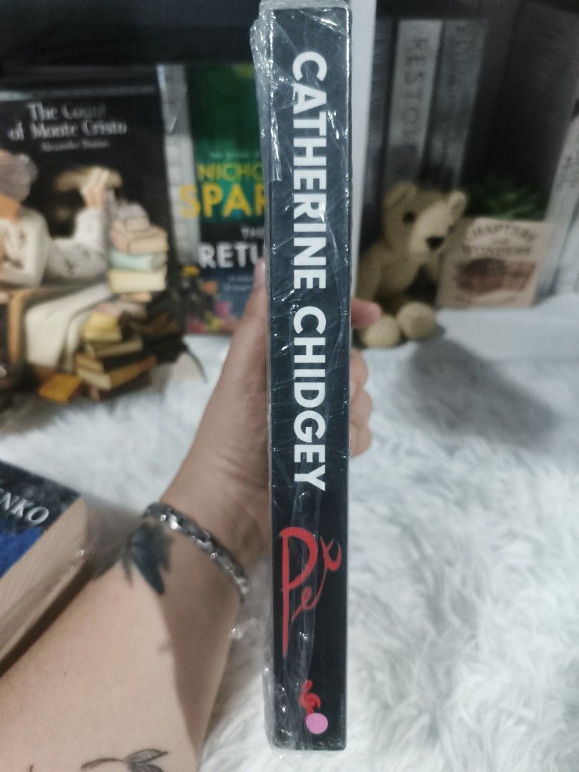 Pet by Catherine Chidgey Novel (Category: Storybooks) located in Cabuyao City. Submitted by chaptersandwonders143 (Listing ID 1469310988, Image 3). Description: - Title: Pet by Catherine Chidgey - Genre: Psychological Thriller (Set in New Zealand) - Plot: Dark themes exploring a young student and her charismatic teacher across 1984 and 2014 - Details: Clean pages, solid spine, paperback.