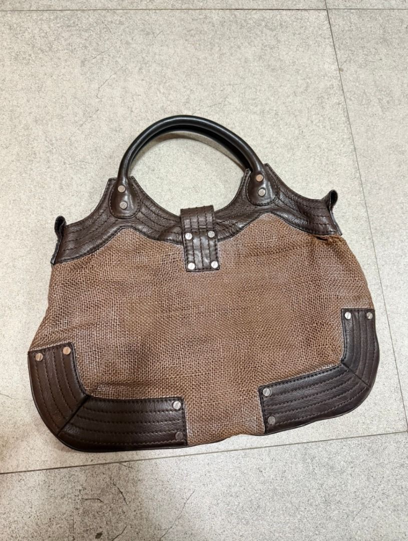 Philippe Charriol Vintage Bag (Category: Shoulder Bags) located in Malabon City. Submitted by angelamaclan (Listing ID 1469244306, Image 2). Description: - Brand: Charriol - Material: Brown woven fabric body with dark brown leather trim and handles - Accents: Metallic studs on side reinforcements - Flaws: Visible fraying on the woven fabric near the upper edge, and minor yellowing stains on the interior lining - Condition: Pre-loved, well-kept ov