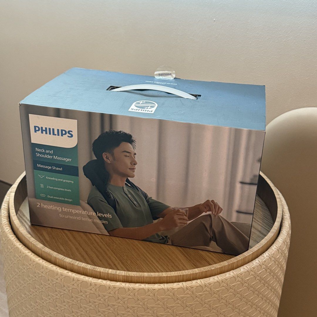 Philips PPM3522 Neck and Shoulder Massager (Category: Massage Devices) located in Marikina City. Submitted by lovegoeson (Listing ID 1469341193, Image 1). Description: - Brand: Philips Neck and Shoulder Massager Shawl (Model PPM3522) - Color: Dark navy blue - Features: 6-point upper back massage with warm kneading action and 2 heating temperature levels - Controls: Easy-to-use buttons located right on the strap - Inclusions: Comes with original b