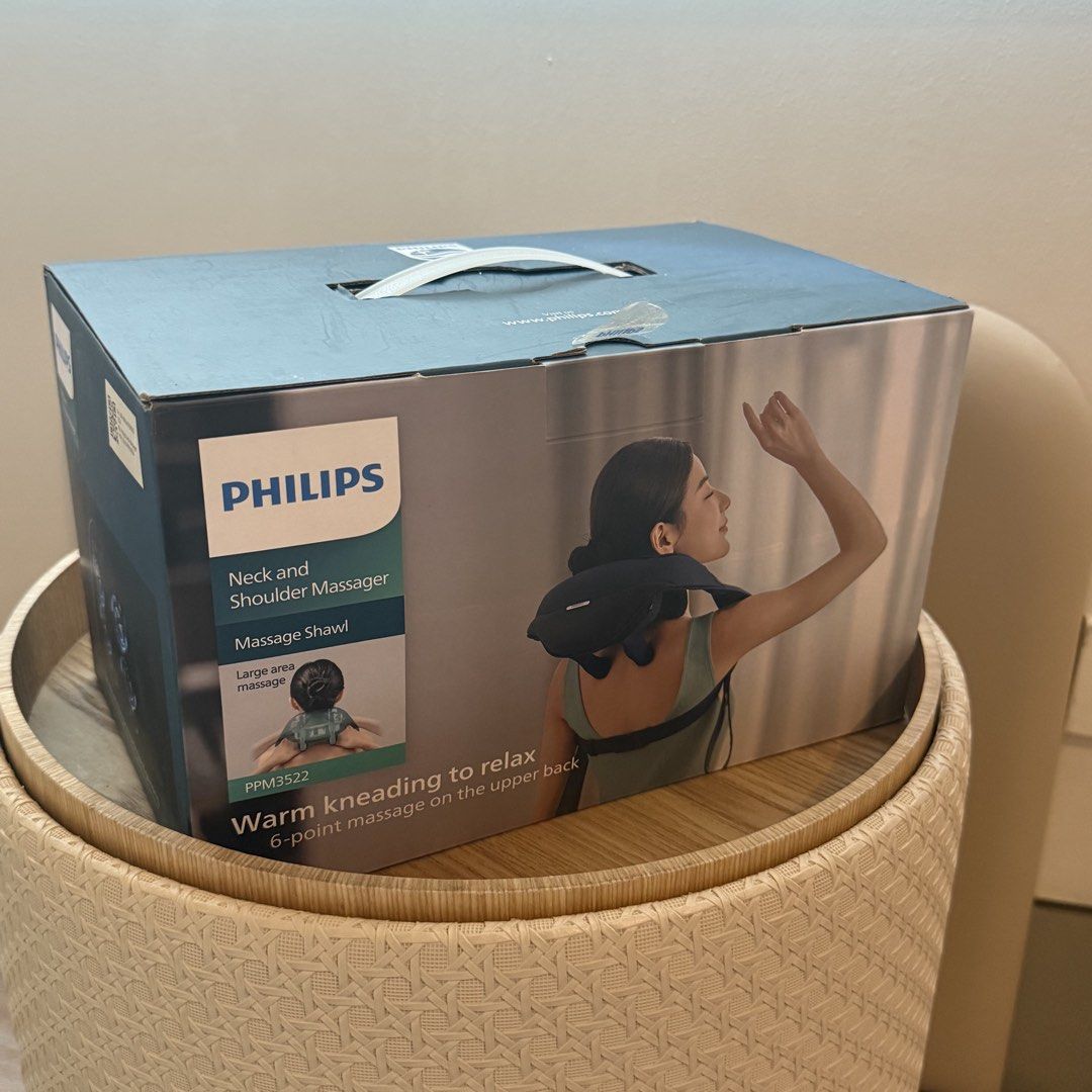 Philips PPM3522 Neck and Shoulder Massager (Category: Massage Devices) located in Marikina City. Submitted by lovegoeson (Listing ID 1469341193, Image 2). Description: - Brand: Philips Neck and Shoulder Massager Shawl (Model PPM3522) - Color: Dark navy blue - Features: 6-point upper back massage with warm kneading action and 2 heating temperature levels - Controls: Easy-to-use buttons located right on the strap - Inclusions: Comes with original b