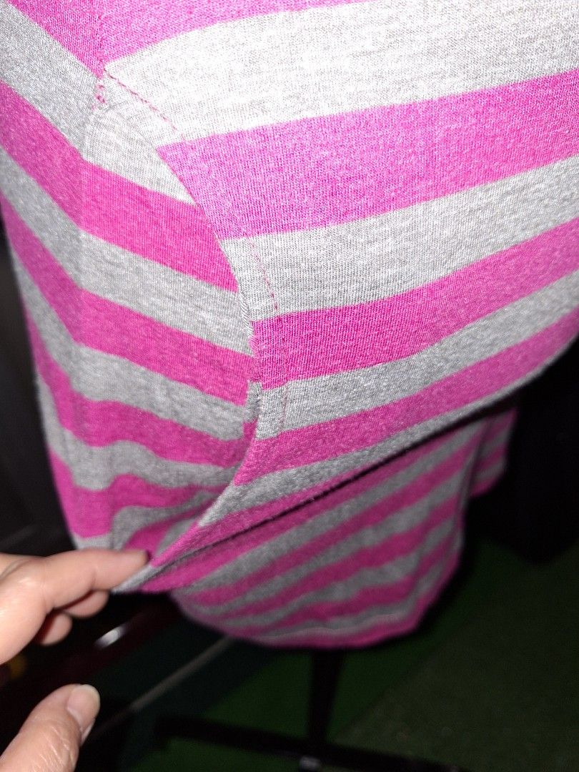 Pink and Grey Striped Dress (Category: Dresses) located in Manila. Submitted by mialiurshop (Listing ID 1469226288, Image 2). Description: - Design: Pink and grey striped pattern - Fit: Bodycon, snug, and stretchy fabric - Details: Three-quarter length sleeves and round neckline - Style: Casual piece, perfect for daily wear - Condition: Grab it before it's gone!.