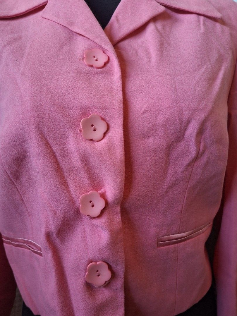Pink Blazer with Flower Buttons (Category: Coats, Jackets and Outerwear) located in Balamban. Submitted by ubethan (Listing ID 1469231028, Image 3). Description: - Vibrant bright pink statement blazer - Chic lapels and long sleeves - Eye-catching 4 large flower-shaped front buttons - Two functional front pockets with flap details - Soft, high-quality textured fabric with clean stitching - Flattering structured fit - Versatile for office wear or c