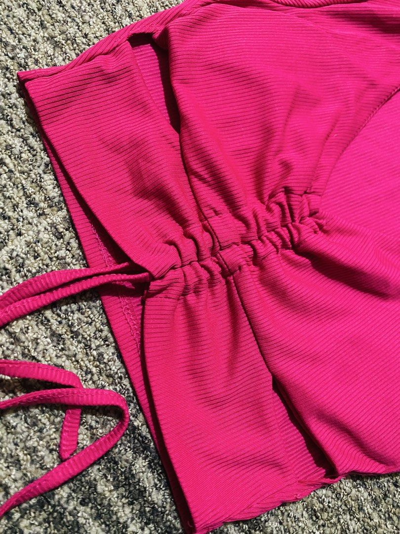 Pink Ribbed Crop Top with Drawstring Detail (Category: Sleeveless) located in Marikina City. Submitted by jessylady10 (Listing ID 1469328811, Image 2). Description: - Style: Bright pink ribbed crop top - Details: V-neck with adjustable drawstring ruched front and hanging tie hem - Material: Soft, stretchy ribbed fabric (Made in Italy) - Fit: Short sleeves, perfect for high-waisted bottoms - Condition: Excellent Gcash payment, Lalamove delivery.
