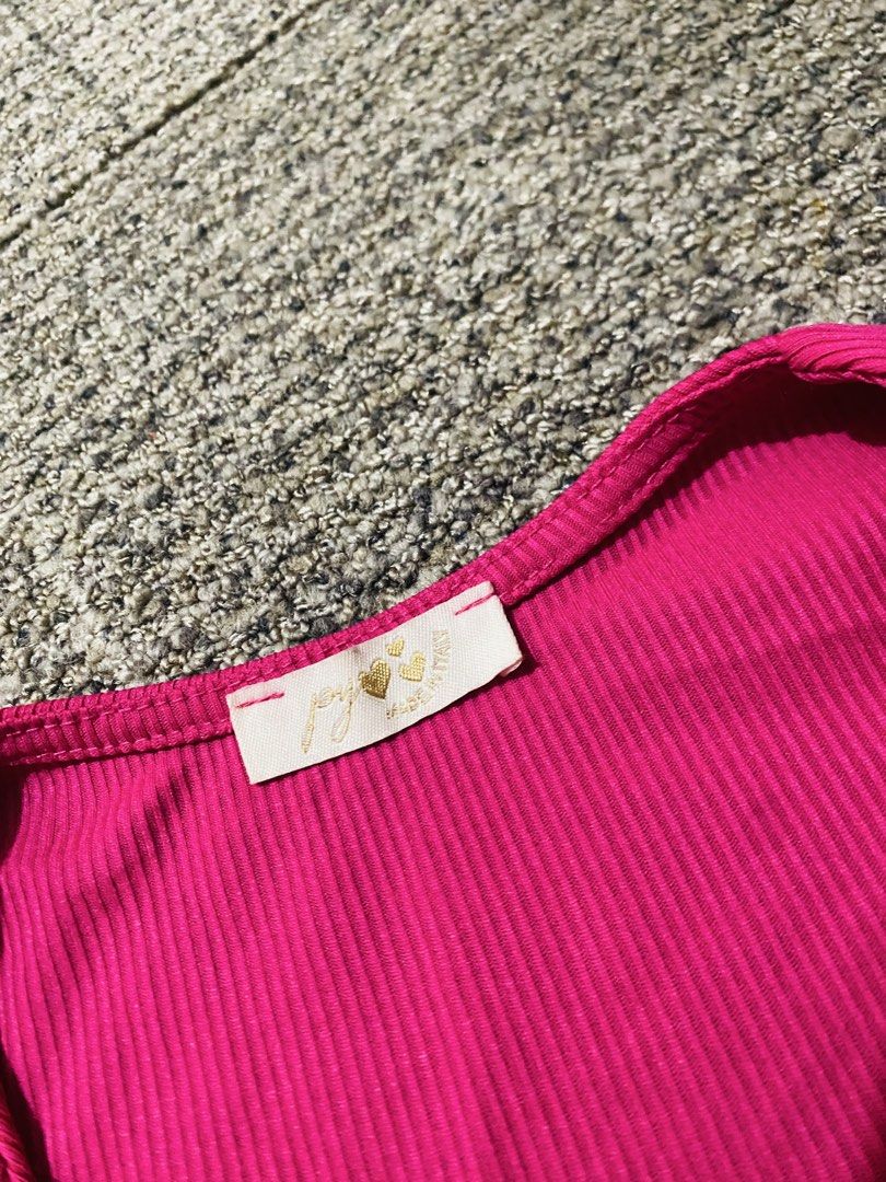 Pink Ribbed Crop Top with Drawstring Detail (Category: Sleeveless) located in Marikina City. Submitted by jessylady10 (Listing ID 1469328811, Image 3). Description: - Style: Bright pink ribbed crop top - Details: V-neck with adjustable drawstring ruched front and hanging tie hem - Material: Soft, stretchy ribbed fabric (Made in Italy) - Fit: Short sleeves, perfect for high-waisted bottoms - Condition: Excellent Gcash payment, Lalamove delivery.