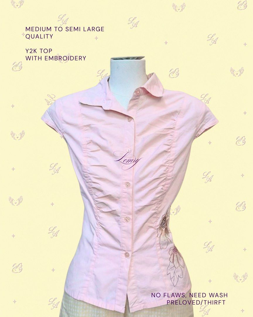 pink y2k button up embroidery (Category: Blouses) located in Baguio. Submitted by boughtoomuch (Listing ID 1469335496, Image 1). Description: - Pink Y2K button-up top with classic collar - Size: Medium to semi-Large - Fit: Fitted cut with flattering ruched sides - Details: Adorable floral embroidery near the bottom hem and short cap sleeves - Condition: Pre-loved thrift find, no flaws spotted, needs a wash.