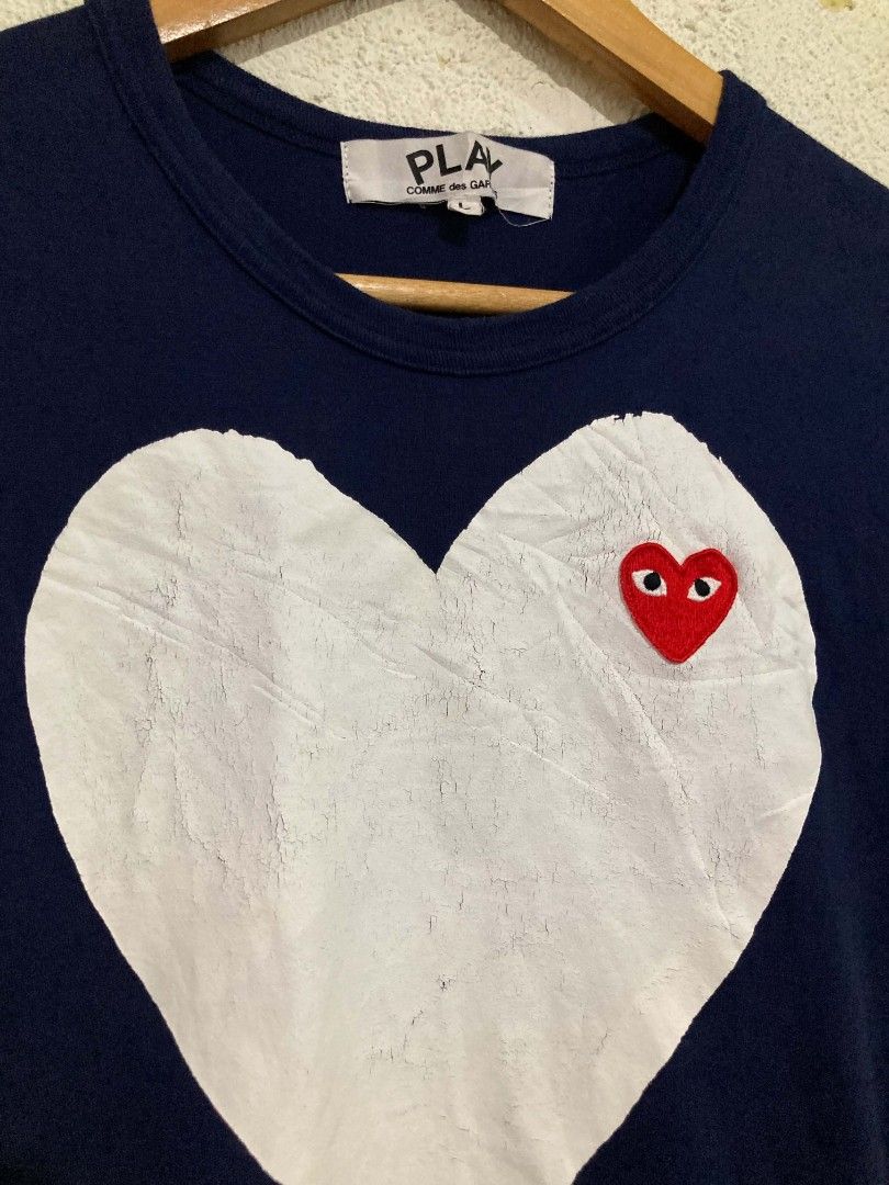 Play CDG Navy Big White Heart Tee (Authentic) (Category: Shirts) located in San Jose del Monte. Submitted by zen31 (Listing ID 1469358862, Image 3). Description: PLAY CDG NAVY BIG WHITE HEART TEE (AUTHENTIC) LARGE ON TAG 16.5X25 DIMENSION GOOD CONDITION 9.5/10 COLOR RATE ISSUE: CRACKPRINT ON LOGO.