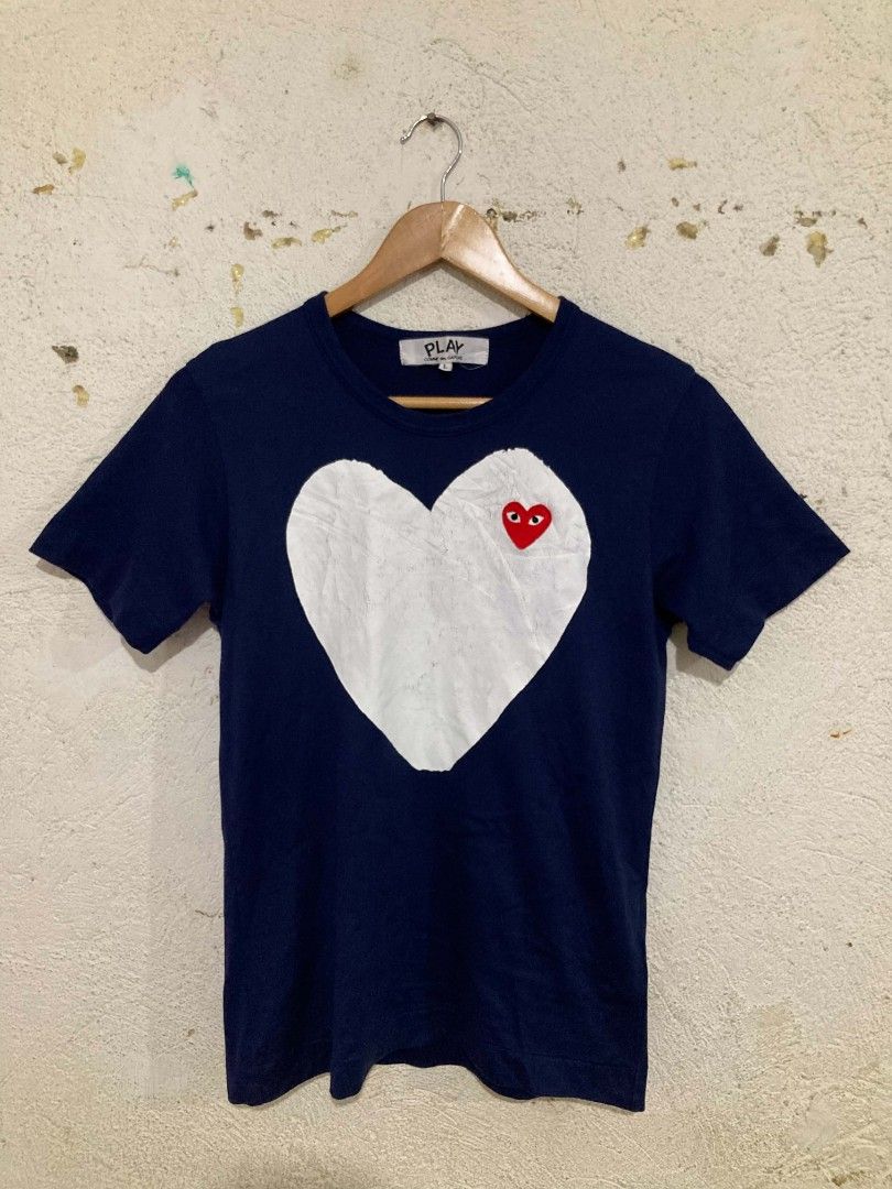 Play CDG Navy Big White Heart Tee (Authentic) (Category: Shirts) located in San Jose del Monte. Submitted by zen31 (Listing ID 1469358862, Image 1). Description: PLAY CDG NAVY BIG WHITE HEART TEE (AUTHENTIC) LARGE ON TAG 16.5X25 DIMENSION GOOD CONDITION 9.5/10 COLOR RATE ISSUE: CRACKPRINT ON LOGO.