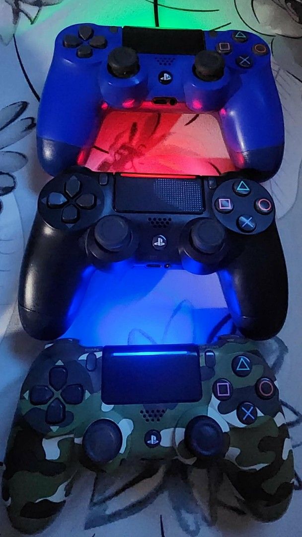 PlayStation 4 Slim Console with Three Controllers (Category: PlayStation) located in Paranaque City. Submitted by yumme (Listing ID 1469234595, Image 3). Description: - includes 2 games over cook game 1 and 2 and 3 controller 🎮 and one dvd it has 1 tb storage - PlayStation 4 Slim console (tested and working perfectly) - Includes 3 DualShock 4 wireless controllers (Black, Blue, and Camouflage) - All controllers light up and connect properly - Ide