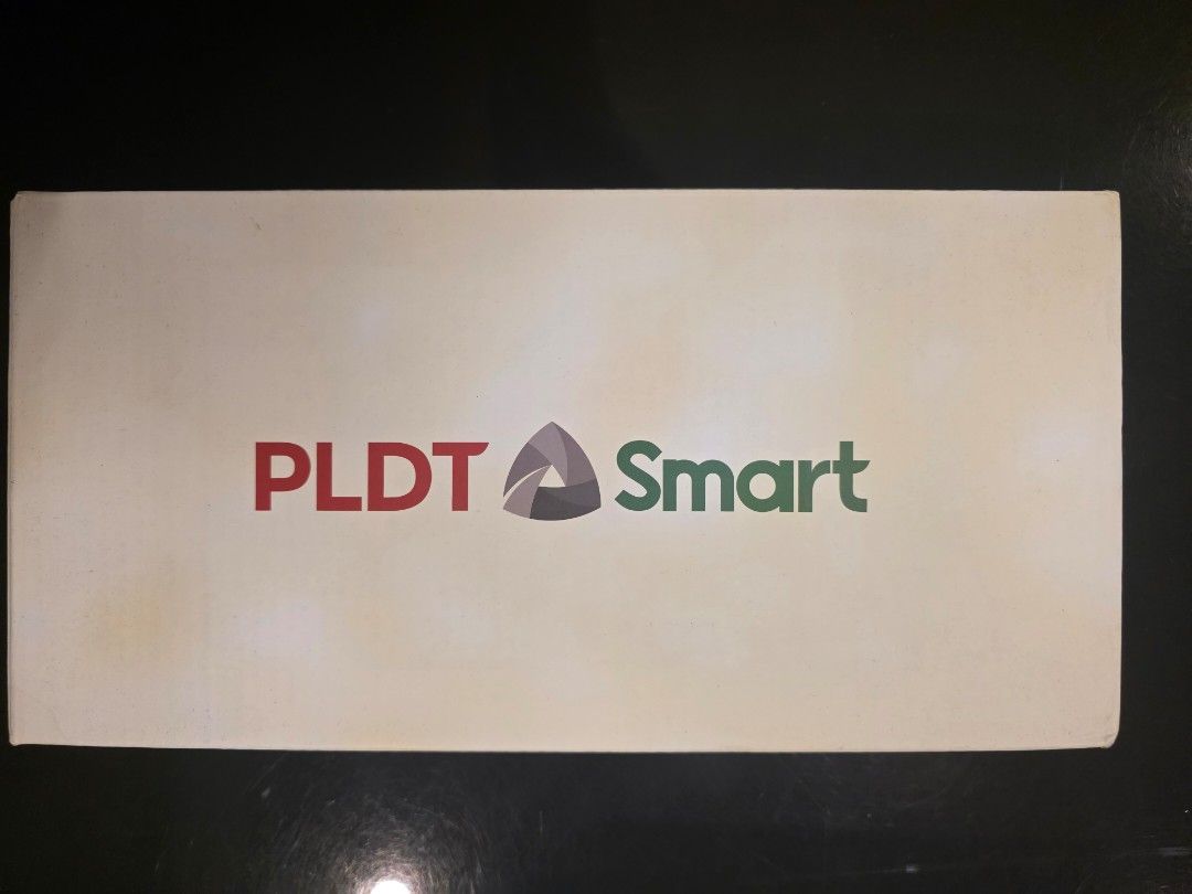 PLDT Smart Prepaid Home WiFi LTE Advanced (Category: Networking) located in Manila. Submitted by collectndeclutt (Listing ID 1469312259, Image 2). Description: - PLDT Smart Prepaid Home Wifi LTE Advanced unit - Up to 2x faster than standard LTE home wifi - Plug-and-play setup for instant internet access - Easy account management and reloading via GigaLife app - Includes original packaging box and white router device - Ready to use for all your ho