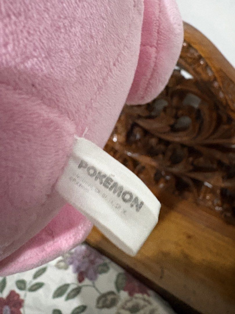 Pokémon Jigglypuff Plush Toy 3rd Round (Category: Plushies & Soft Toys) located in Quezon City. Submitted by rxyel (Listing ID 1469262664, Image 3). Description: - Official 3rd Round Pokémon Jigglypuff plush - Soft pink fabric with embroidered teal eyes and black-tipped ears - Authentic side branding tag attached - Pristine, clean condition with no stains or damage - Perfect addition to any Pokémon collection.