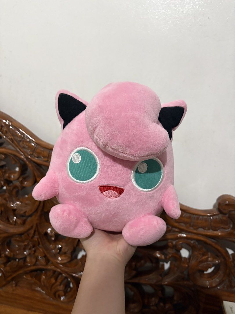Pokémon Jigglypuff Plush Toy 3rd Round (Category: Plushies & Soft Toys) located in Quezon City. Submitted by rxyel (Listing ID 1469262664, Image 2). Description: - Official 3rd Round Pokémon Jigglypuff plush - Soft pink fabric with embroidered teal eyes and black-tipped ears - Authentic side branding tag attached - Pristine, clean condition with no stains or damage - Perfect addition to any Pokémon collection.