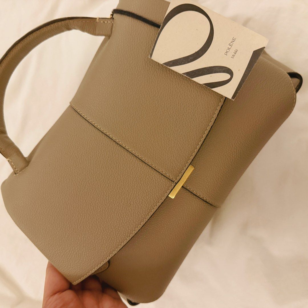 polene mokki (Category: Shoulder Bags) located in Quezon City. Submitted by gutchiboi (Listing ID 1469283261, Image 1). Description: Authentic Polène Mokki – Textured Taupe Purchased personally by my wife in Paris in 2025. Crafted from premium Italian calf leather, featuring Polène’s signature sculptural design, gold-tone hardware, and detachable shoulder strap. Condition: Mint / Pristine. The strap’s hardware still has its original protective fi