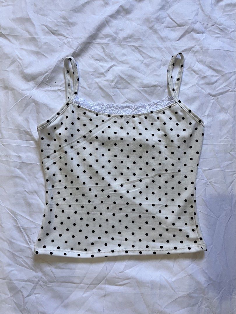 Polka dot tops (Category: Sleeveless) located in Imus. Submitted by themaison.ph (Listing ID 1469188330, Image 2). Description: • brand new • all tops are stretchable • size : small - xl • padded tops (blue & pink) .
