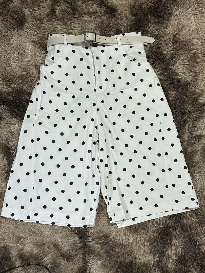 Polka Jorts with Belt (Category: Shorts) located in Manila. Submitted by bizfits_ (Listing ID 1469358281, Image 3). Description: - Polka dot high-waist shorts - Available in 2 colors: Black and White - Includes matching white belt with silver buckle - Features functional front pockets - Knee-length, retro-inspired style - Easy to pair with basic tees and tanks - Perfect addition to your warm-weather wardrobe - Brand new and ready to ship!.