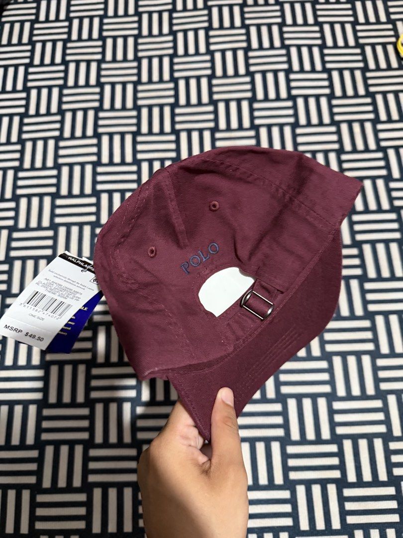 Polo Ralph Lauren Maroon Baseball Cap (Category: Caps & Hats) located in Manila. Submitted by garcianath68674 (Listing ID 1469285295, Image 2). Description: - Brand: Polo Ralph Lauren - Color: Maroon - Material: 100% Cotton - Condition: Brand new with original retail tags (MSRP $49.50) - Size: One size fits all (Adjustable metal buckle closure) - Details: Iconic embroidered pony logo on the front and POLO text stitched on the back strap.