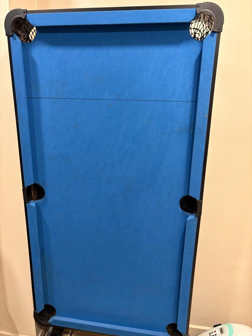 Pool Table (Category: Billiards & Bowling) located in Singapore. Submitted by sgcheapitem (Listing ID 1469193348, Image 1). Description: foldable pool table, comes with 2 cues, chalk, and a set of billiard balls Length 140cm x Width 75cm Base to top 165cm height PM if int .