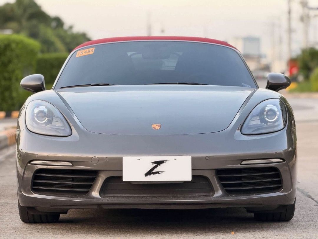 Porsche 718 2.0 Boxster PDK (M) (Category: Used Cars) located in Caloocan City. Submitted by bsentrep.serranojigsp-77689 (Listing ID 1469200897, Image 2). Description: Elegance in every detail. Performance without compromise. 💯 For Sale | Trade-In | Financing Accepted 2024 Porsche Boxster 718 Automatic Transmission Mileage: 5k+ Original Mileage Ending Plate: Friday Coding Color: Gray Engine: 2.0L Turbocharged Flat 4-Boxer Fuel Type: Gasoline Upg