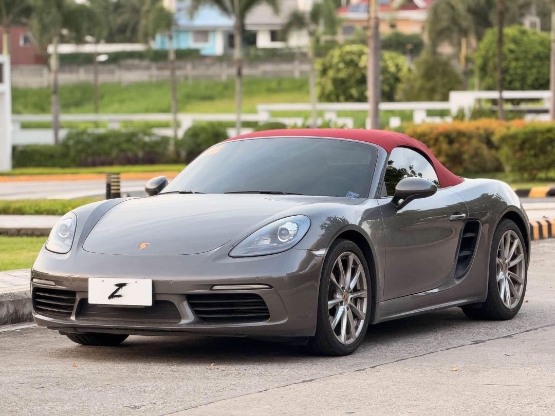 Porsche 718 2.0 Boxster PDK (M) (Category: Used Cars) located in Caloocan City. Submitted by bsentrep.serranojigsp-77689 (Listing ID 1469200897, Image 1). Description: Elegance in every detail. Performance without compromise. 💯 For Sale | Trade-In | Financing Accepted 2024 Porsche Boxster 718 Automatic Transmission Mileage: 5k+ Original Mileage Ending Plate: Friday Coding Color: Gray Engine: 2.0L Turbocharged Flat 4-Boxer Fuel Type: Gasoline Upg