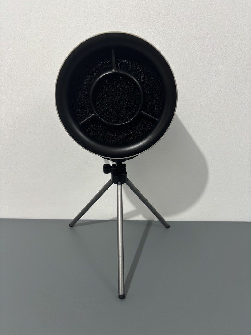 Portable Range Hood with Tripod (Category: Hobs & Hoods) located in Manila. Submitted by safefire.ae92b7 (Listing ID 1469358445, Image 2). Description: Portable Range Hood - Color: Grey cylindrical body with black front grille and filter pad - Design: Mounted on an adjustable metal tripod stand with a convenient side strap handle - Power: USB Type-C port on the back - Perfect for: Perfect for condos without a range hood, gets rid of smoke fast an