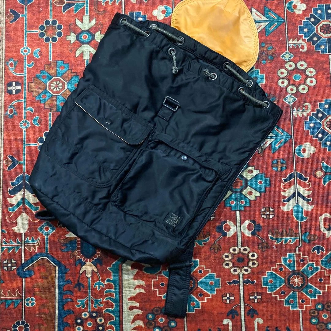 Porter Yoshida & Co. Tanker Backpack (Category: Backpacks) located in Antipolo. Submitted by bentakahitanoano (Listing ID 1469391668, Image 3). Description: Porter-Yoshida & Co. Tanker Flap Rucksack / Backpack – Black An iconic, Japanese-made streetwear staple blending military heritage with practical functionality. Known for its incredibly lightweight yet highly durable padded construction, this signature rucksack features dual asymmetric exteri