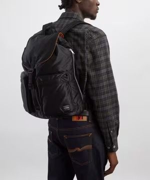 Porter Yoshida & Co. Tanker Backpack (Category: Backpacks) located in Antipolo. Submitted by bentakahitanoano (Listing ID 1469391668, Image 2). Description: Porter-Yoshida & Co. Tanker Flap Rucksack / Backpack – Black An iconic, Japanese-made streetwear staple blending military heritage with practical functionality. Known for its incredibly lightweight yet highly durable padded construction, this signature rucksack features dual asymmetric exteri