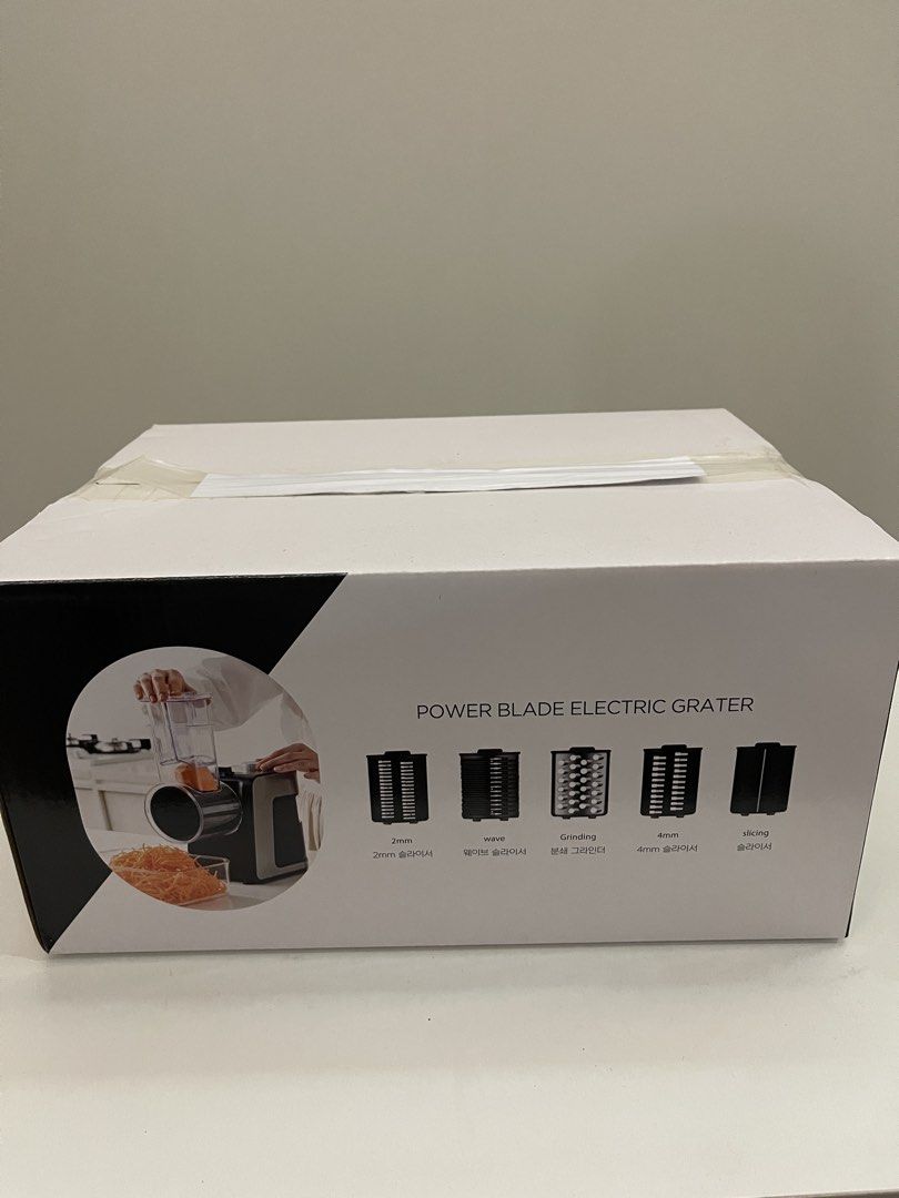 Power Blade Electric Grater Kitchen Food Processor (Category: Juicers, Blenders & Grinders) located in Quezon City. Submitted by bravehorse_f1f6d5 (Listing ID 1469277578, Image 2). Description: - Brand new, unopened, and sealed in box - Includes 5 interchangeable blades: 2mm shredding, 4mm shredding, wave slicing, standard slicing, and grinding - Perfect for quick and easy prep of vegetables, nuts, and cheese - Fast and hassle-free setup - Meetup