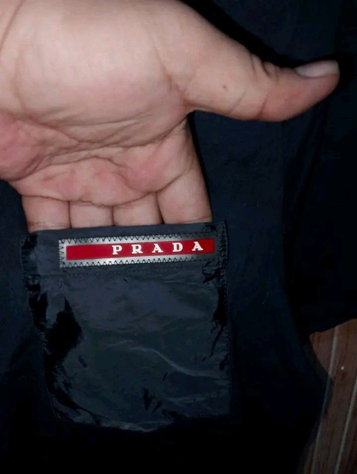 PRADA (Category: Tshirts & Polo Shirts ) located in Taguig. Submitted by clothingselection (Listing ID 1469327322, Image 3). Description: PTPA AUTHENTIC PRADA POCKET TEE M SIZE FOR MEN L SIZE FOR WOMEN WIDTH 19 LENGTH 26 EXCELLENT CONDITION NID WASH FRESH FROM BALE.