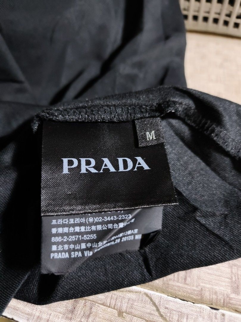 Prada Girocollo Ricamo Shirt (Category: Tshirts & Polo Shirts ) located in Puerto Princesa. Submitted by dripthrift99 (Listing ID 1469164074, Image 3). Description: Prada Girocollo Ricamo Shirt Medium 21" width 26.5" length Excellent condition no any issue loc: palawan.