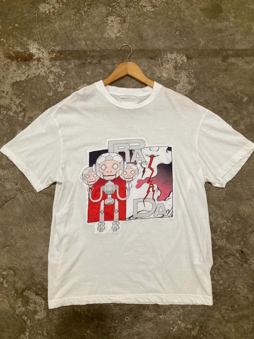 Prada Monkey Robot Graphic Tee (Authentic) (Category: Tshirts & Polo Shirts ) located in San Jose del Monte. Submitted by zen31 (Listing ID 1469359202, Image 1). Description: PRADA TEE (AUTHENTIC) 21.5X27 DIMENSION EXCELLENT CONDITION 10/10 COLOR RATE NO ISSUE.