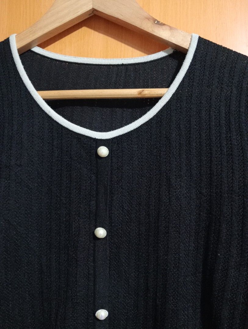 Preloved Black Button Eyelet Knitted Top (Category: Blouses) located in Manila. Submitted by cenasells (Listing ID 1469339119, Image 3). Description: Preloved Knitted Crochet Eyelet Width: 19.5 inches Length : 21 inches Fabric : Knitted Crochet.