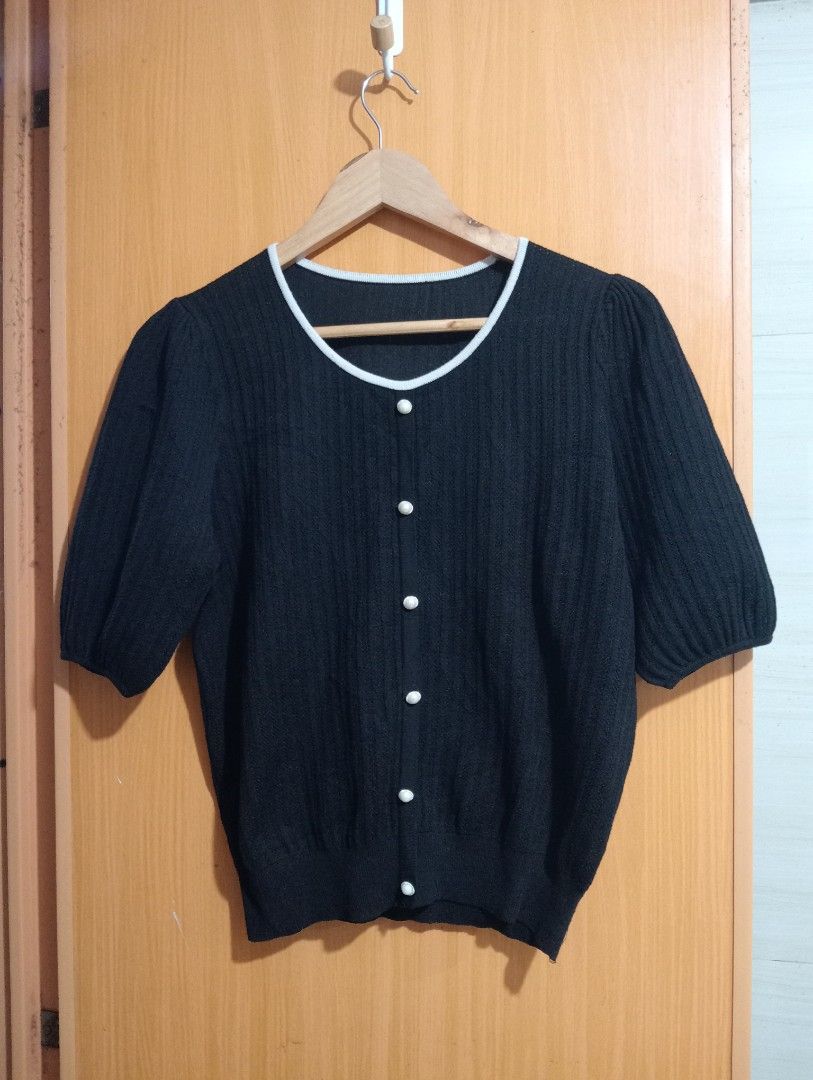 Preloved Black Button Eyelet Knitted Top (Category: Blouses) located in Manila. Submitted by cenasells (Listing ID 1469339119, Image 2). Description: Preloved Knitted Crochet Eyelet Width: 19.5 inches Length : 21 inches Fabric : Knitted Crochet.