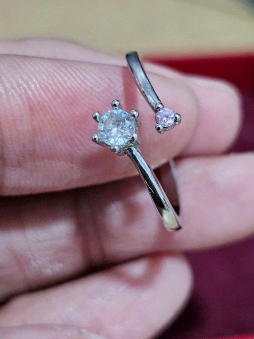 Pre-loved S925 Silver Open Ring with Clear and Pink Crystals (Category: Rings) located in Caloocan City. Submitted by smart_shoppers_ville (Listing ID 1469169692, Image 3). Description: - Material: Genuine S925 Sterling Silver (hallmarked) - Design: Adjustable minimalist wrap style with open ends - Stones: Features a larger clear crystal and a smaller pink crystal - Comfort: Easy to adjust and comfortable for daily wear.