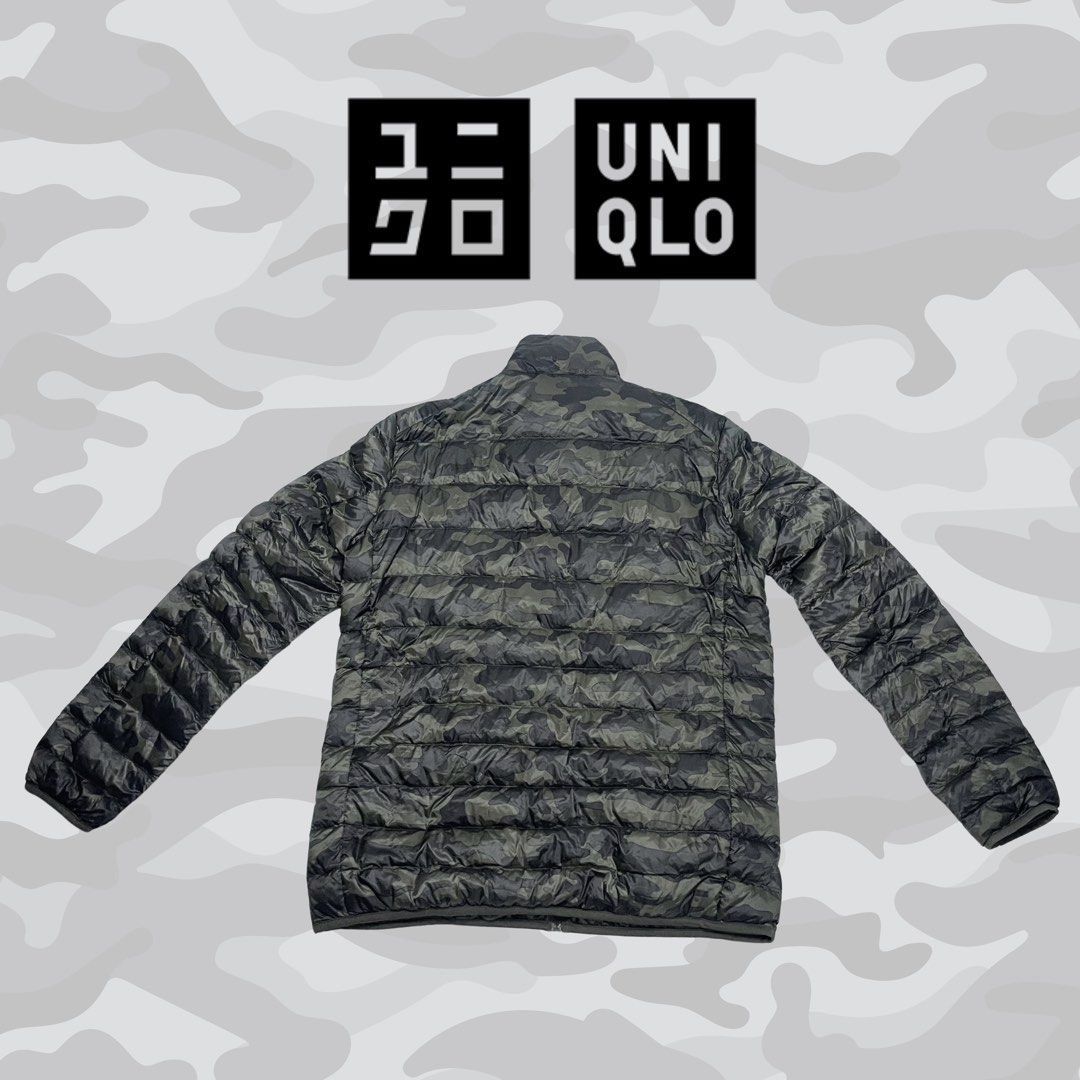 Pristine Uniqlo Ultra Light Camo Down Puffer Jacket - Size Large (Category: Coats, Jackets and Outerwear) located in Tagaytay City. Submitted by barenwolf (Listing ID 1469193065, Image 2). Description: Command attention with this exceptional Uniqlo Ultra Light Camo Down puffer jacket. Rendered in a sophisticated woodland camouflage print with a matte finish, this brand new piece combines superior warmth with effortless portability. Featuring full