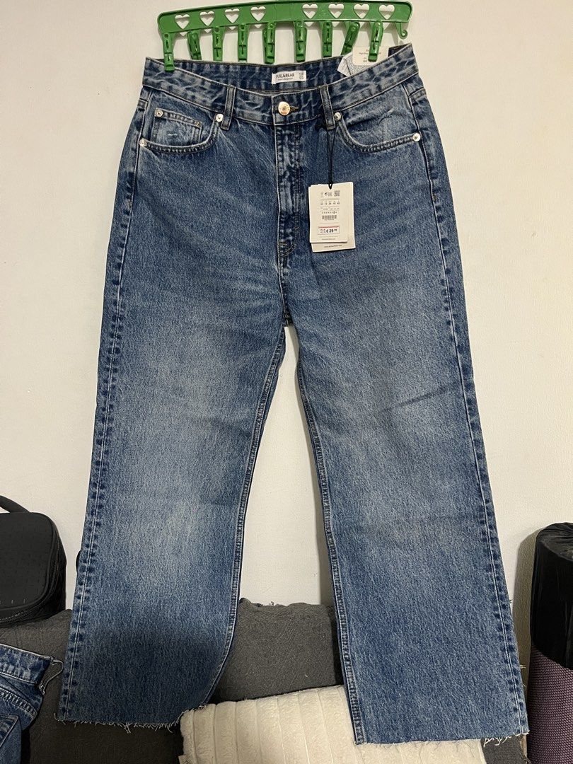 Pull&Bear High Rise Full Length Straight Jeans (Category: Jeans) located in Manila. Submitted by mazerunnr (Listing ID 1469303762, Image 1). Description: - Brand: Pull&Bear - Style: High rise straight leg with full length fit - Color: Medium wash blue - Details: Raw hem, button fly closure, and branded hardware - Pockets: Classic five-pocket design - Condition: Brand new with original tags attached.
